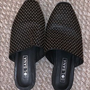 Black slides with gold stud detail